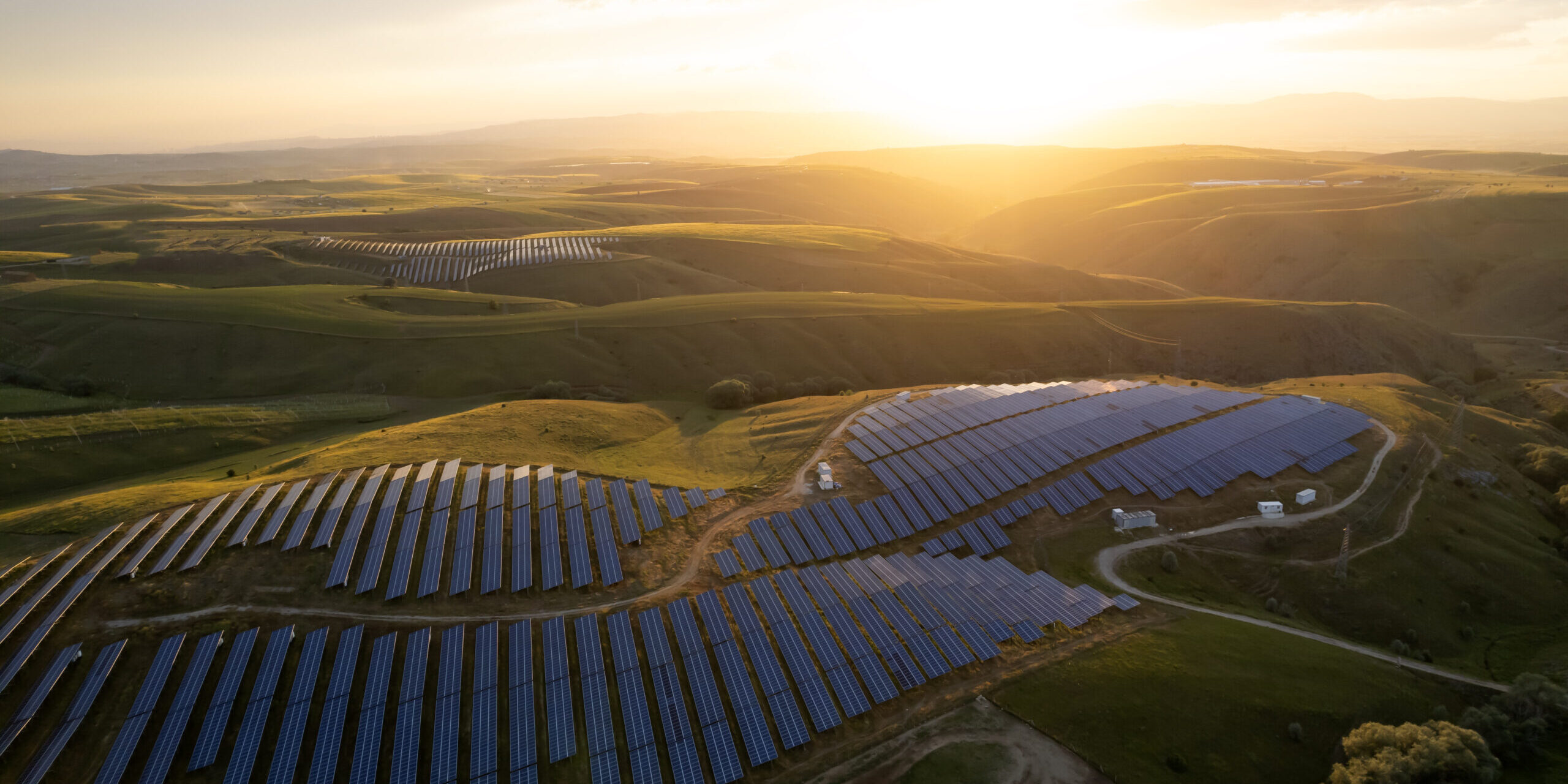 Aerial view of solar panel at sunset set