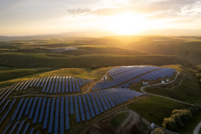 Aerial view of solar panel at sunset set