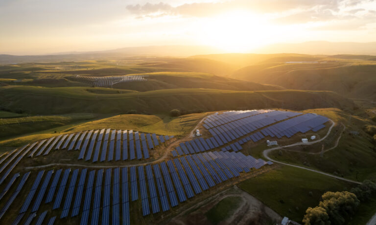Aerial view of solar panel at sunset set
